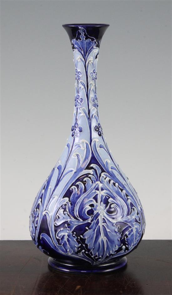 A Macintyre Moorcroft Florian Ware Iris pattern bottle vase, c.1900, 24.5cm